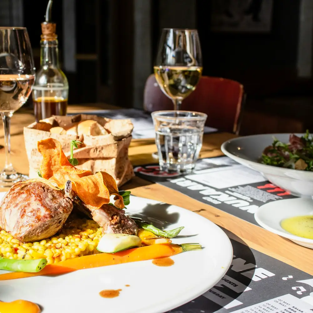 Shared plates and glasses on a table