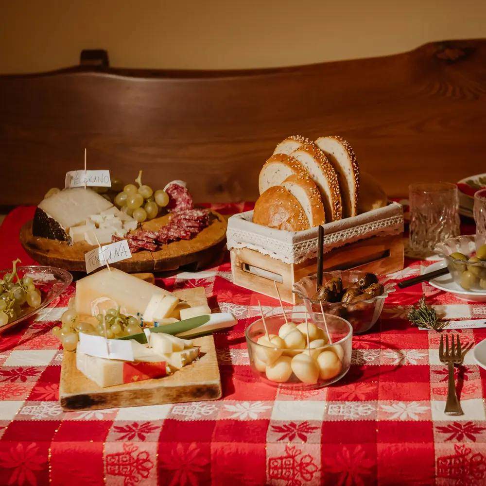 A table full of plates and bowls of food