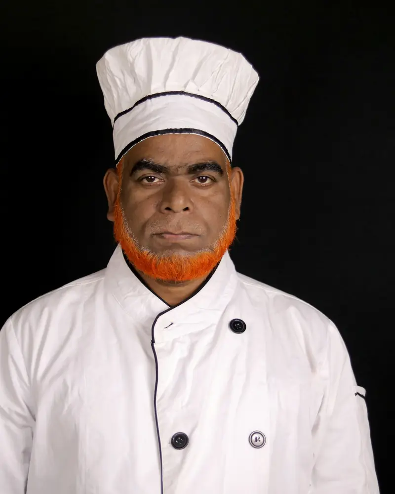 A chef in a white uniform